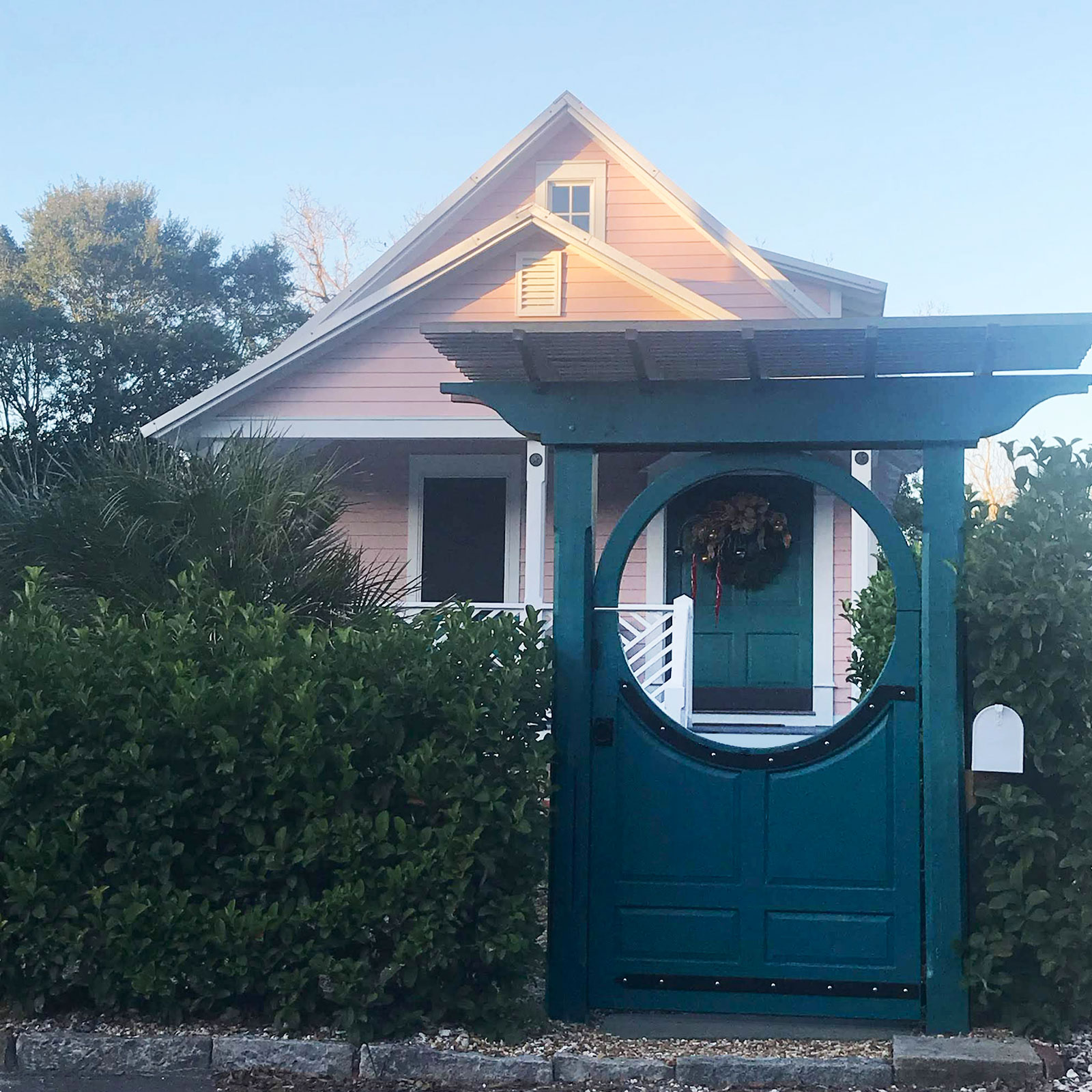 Front decorative gate with a view to the entrance to the house in the Historic District